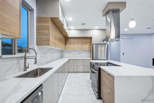 kitchen featuring light stone counters, island range hood, stainless steel appliances, a sink, and modern cabinets