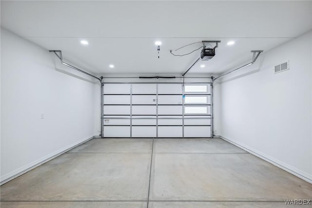 garage with recessed lighting, baseboards, visible vents, and a garage door opener