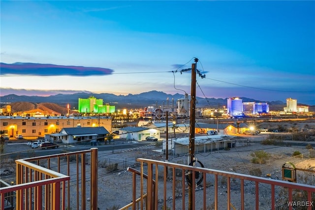 property's view of city with a mountain view