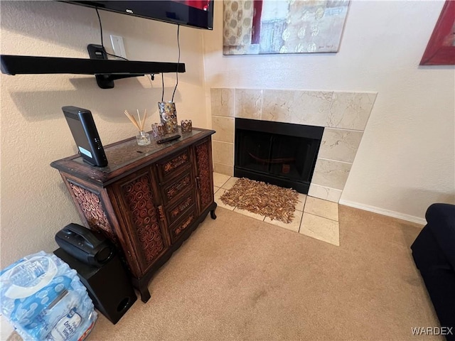 details with carpet floors and a tile fireplace
