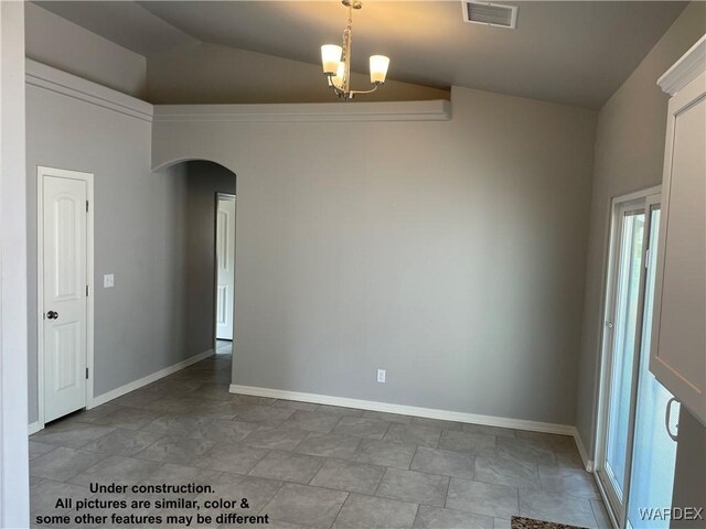 unfurnished room featuring lofted ceiling, baseboards, visible vents, and arched walkways