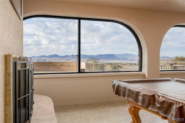 playroom featuring a mountain view, baseboards, and billiards