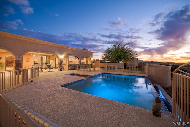 view of pool featuring a fenced in pool and a patio