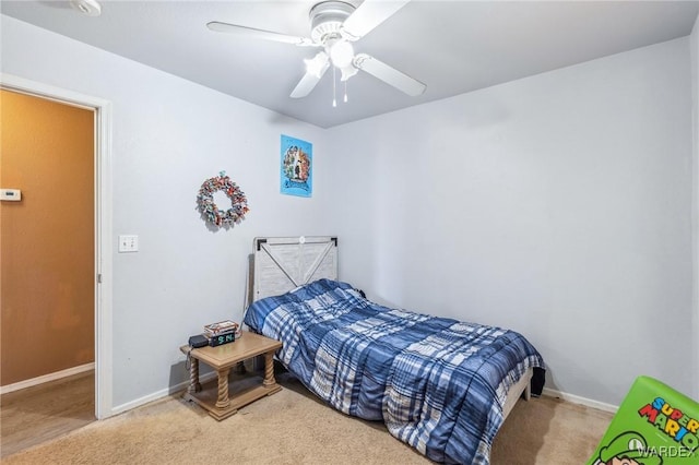 bedroom featuring ceiling fan, baseboards, and carpet flooring