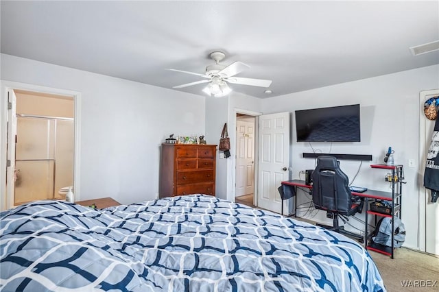 carpeted bedroom with ceiling fan and visible vents