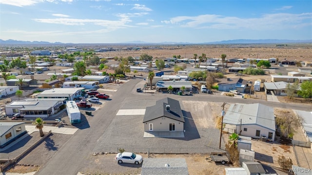 drone / aerial view featuring a mountain view and a residential view