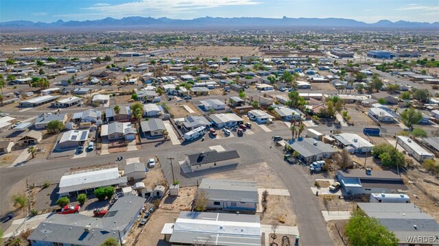 birds eye view of property featuring a residential view and a mountain view