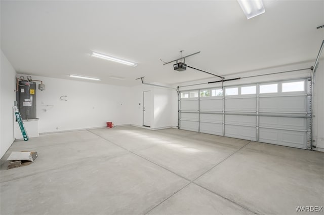 5685 S Ruby St, Fort Mohave, AZ 86426 - garage featuring water heater and a garage door opener