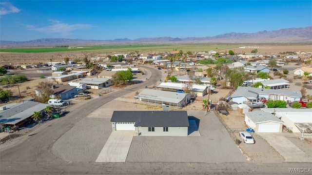 bird's eye view featuring a residential view and a mountain view