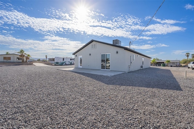 exterior space featuring central AC and a patio