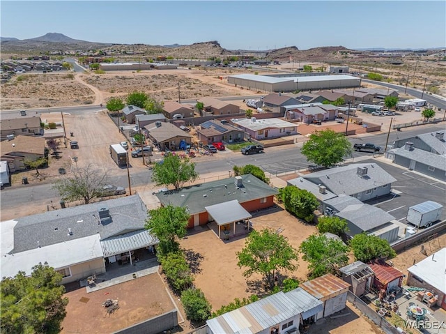 bird's eye view with a desert view, a mountain view, and a residential view