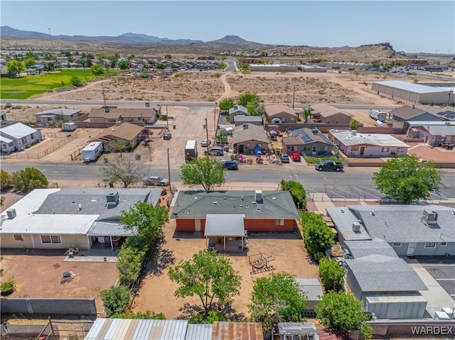 birds eye view of property with a residential view and a mountain view