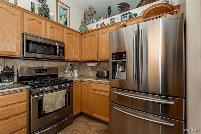 kitchen featuring tasteful backsplash and appliances with stainless steel finishes