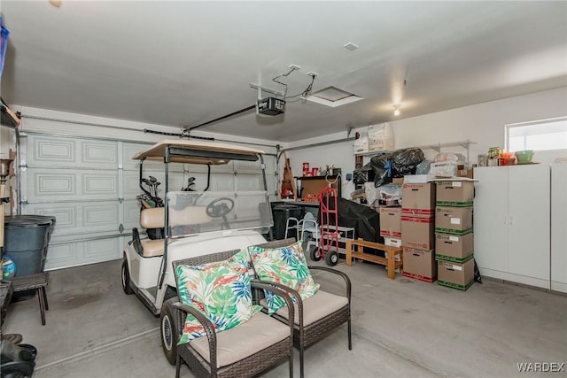 garage featuring a garage door opener