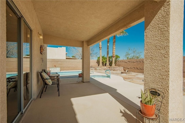 view of patio with a fenced backyard