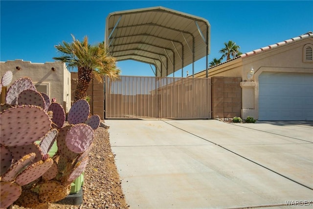 view of gate featuring fence