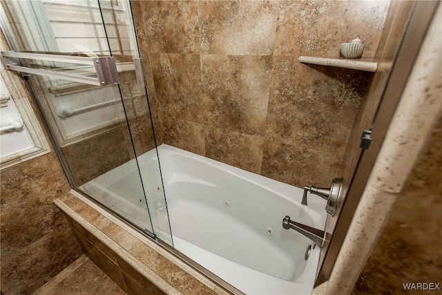 bathroom featuring a combined bath / shower with jetted tub