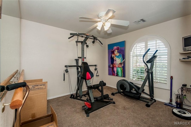 workout room featuring visible vents, carpet, and a ceiling fan