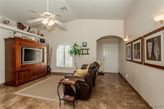 living room with a ceiling fan, visible vents, baseboards, lofted ceiling, and arched walkways