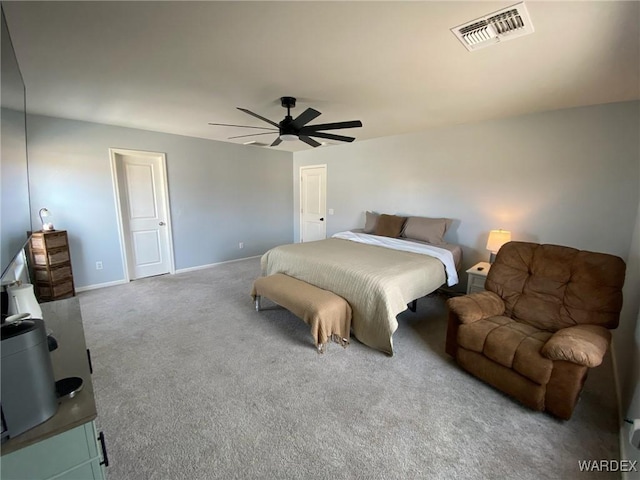 bedroom featuring carpet floors, baseboards, a ceiling fan, and visible vents