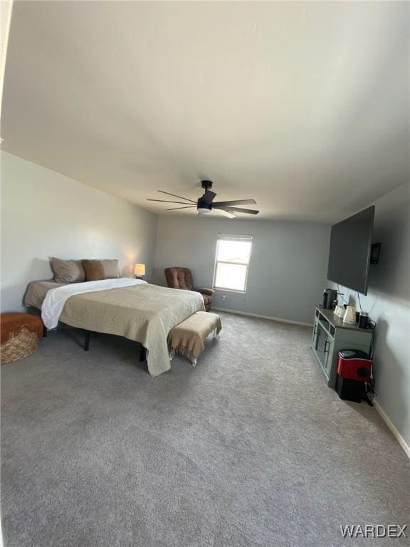bedroom featuring carpet flooring, baseboards, and ceiling fan