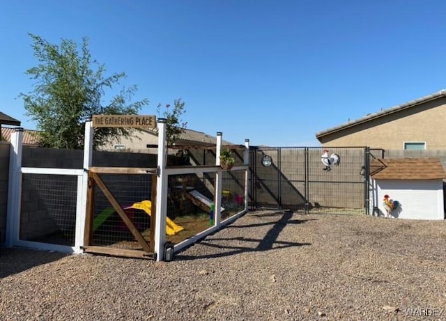view of yard featuring a gate and fence