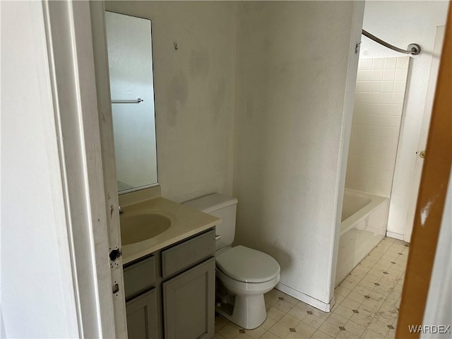 bathroom featuring washtub / shower combination, vanity, toilet, and tile patterned floors