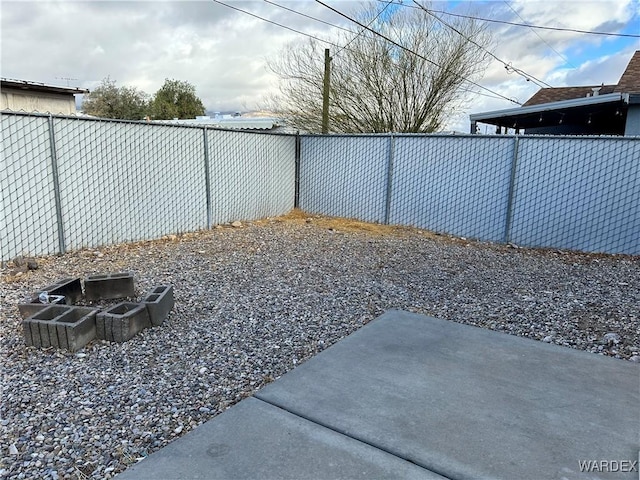 view of yard featuring a fenced backyard and a patio