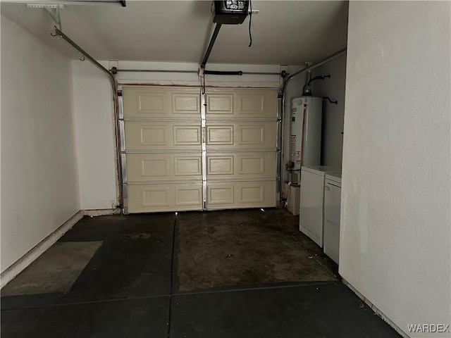 garage featuring a garage door opener, washing machine and dryer, and gas water heater