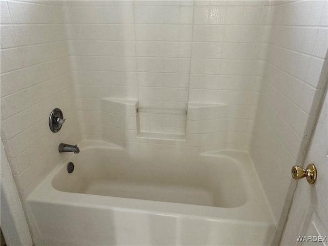 full bath featuring washtub / shower combination