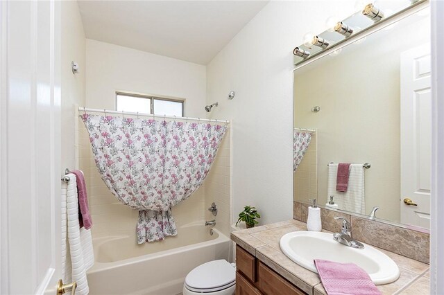4049 S Cassidy Dr, Fort Mohave, AZ 86426 - full bathroom with vanity, shower / tub combo, and toilet