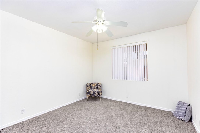 4049 S Cassidy Dr, Fort Mohave, AZ 86426 - carpeted spare room with baseboards and a ceiling fan