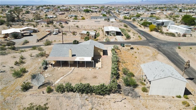 aerial view featuring a mountain view and a residential view
