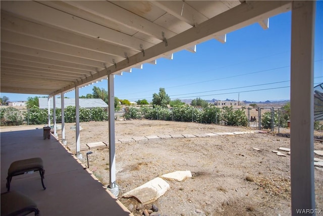 view of patio with fence