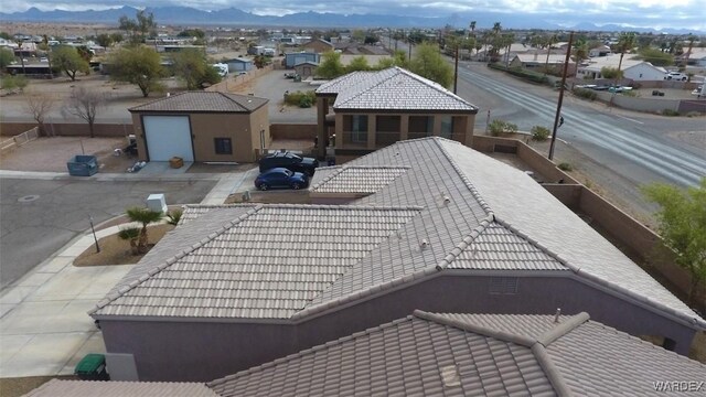 bird's eye view featuring a mountain view and a residential view