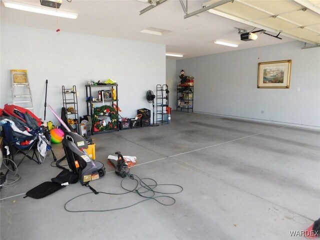 garage featuring a garage door opener