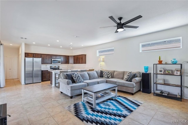 living area featuring recessed lighting, visible vents, a ceiling fan, and light tile patterned flooring