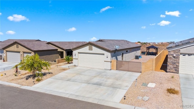 single story home featuring driveway, a tile roof, an attached garage, a gazebo, and stucco siding