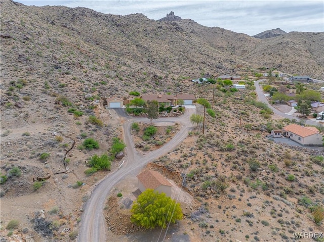 aerial view featuring a rural view, a mountain view, and a desert view