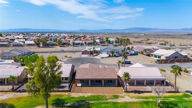 birds eye view of property featuring a residential view and a mountain view