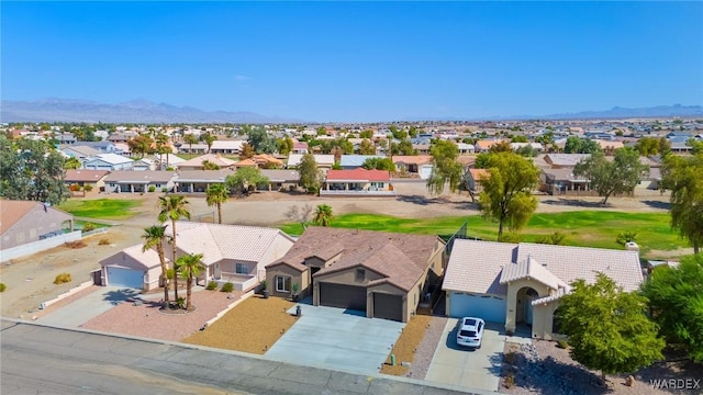 bird's eye view featuring a residential view and a mountain view