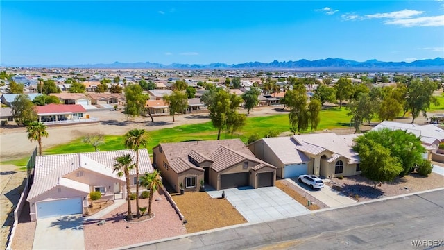 bird's eye view featuring a residential view and a mountain view