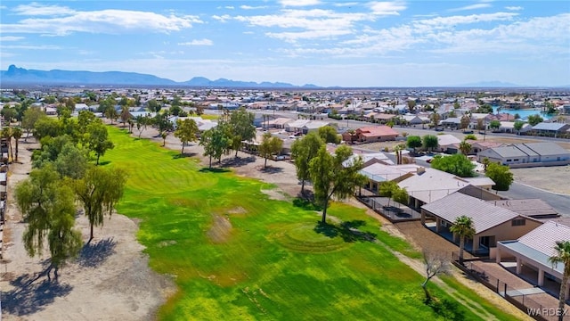 aerial view featuring golf course view, a residential view, and a mountain view