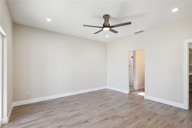 spare room with ceiling fan, recessed lighting, visible vents, baseboards, and light wood finished floors