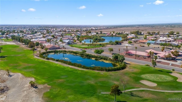 birds eye view of property featuring a residential view, a water view, and golf course view