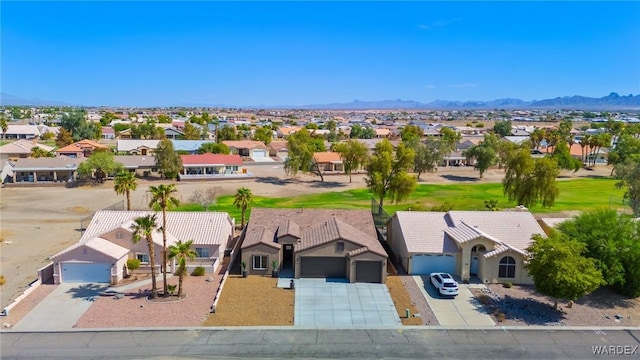 bird's eye view with a residential view and a mountain view