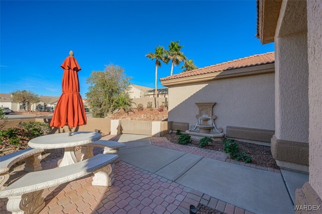 view of patio / terrace with fence