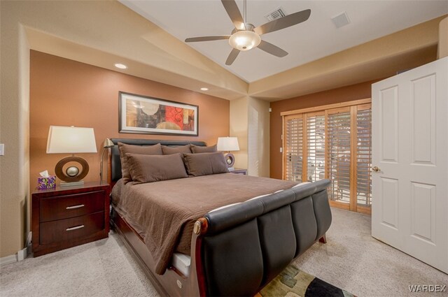 bedroom featuring access to exterior, lofted ceiling, light carpet, and visible vents