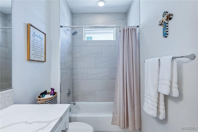 full bathroom with toilet, shower / tub combo, and vanity