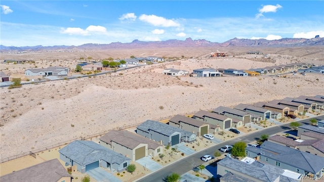 bird's eye view featuring a residential view and a mountain view